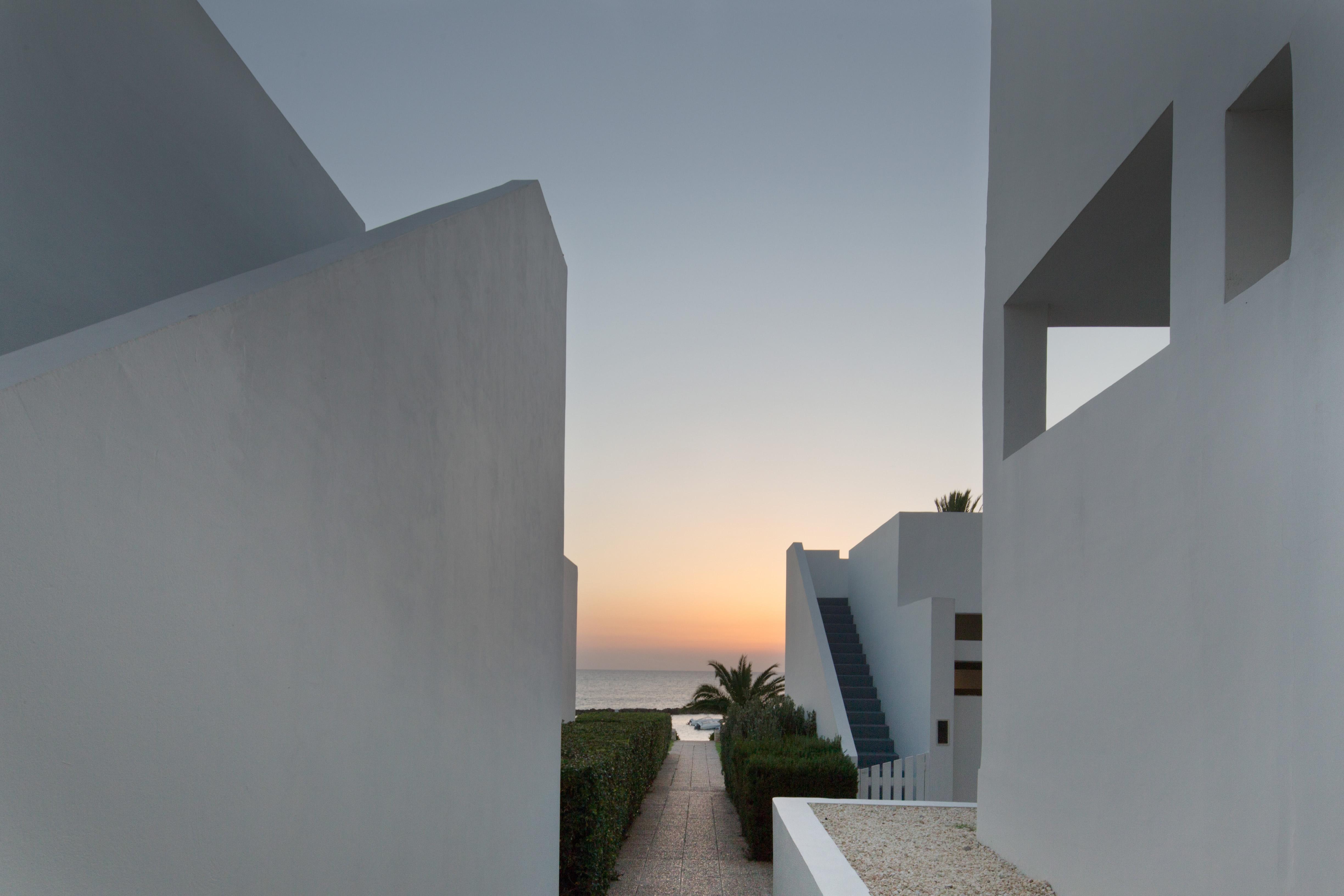Almyra Hotel Paphos Exterior photo The hotel at sunset