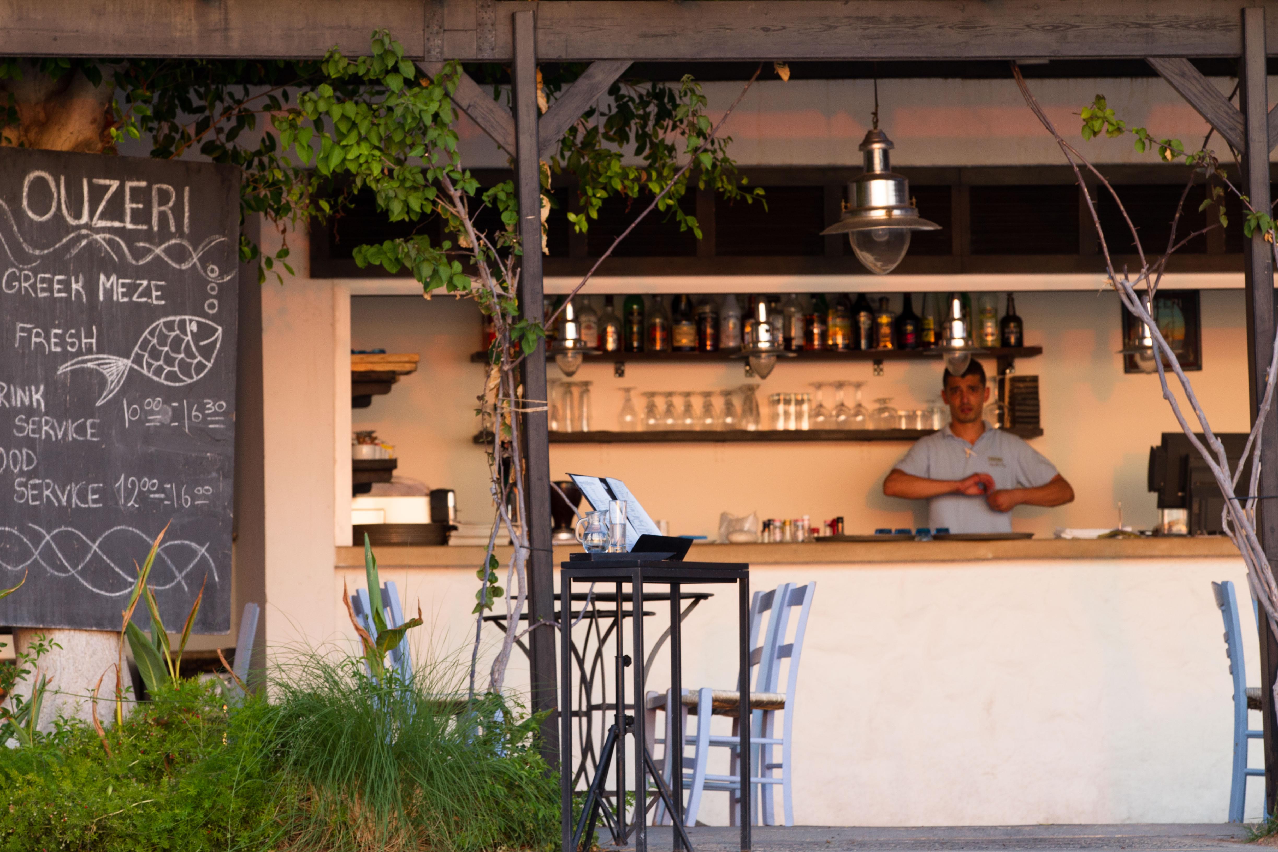 Almyra Hotel Paphos Exterior photo A tavern in Athens
