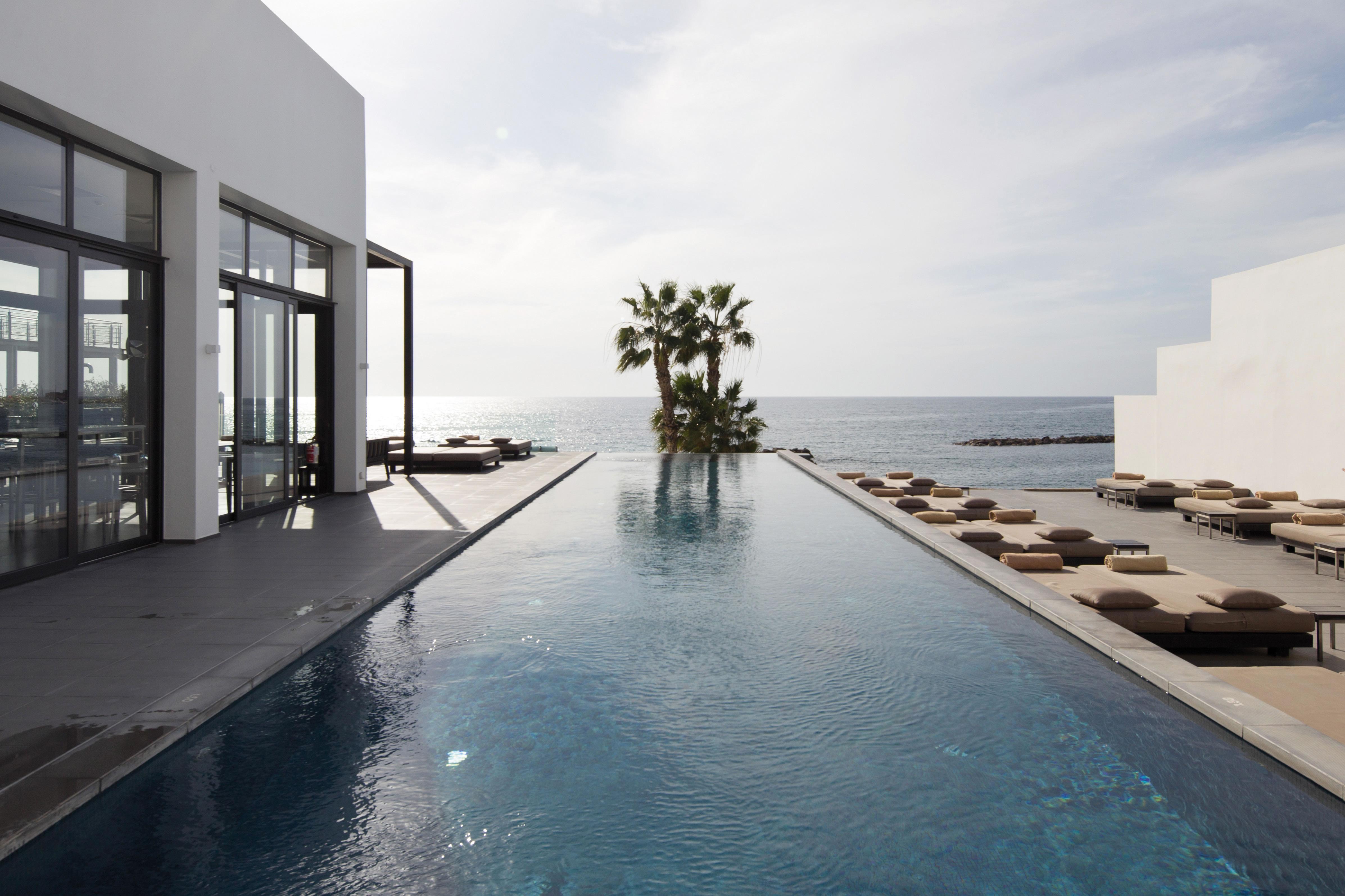 Almyra Hotel Paphos Exterior photo The pool at the Hotel