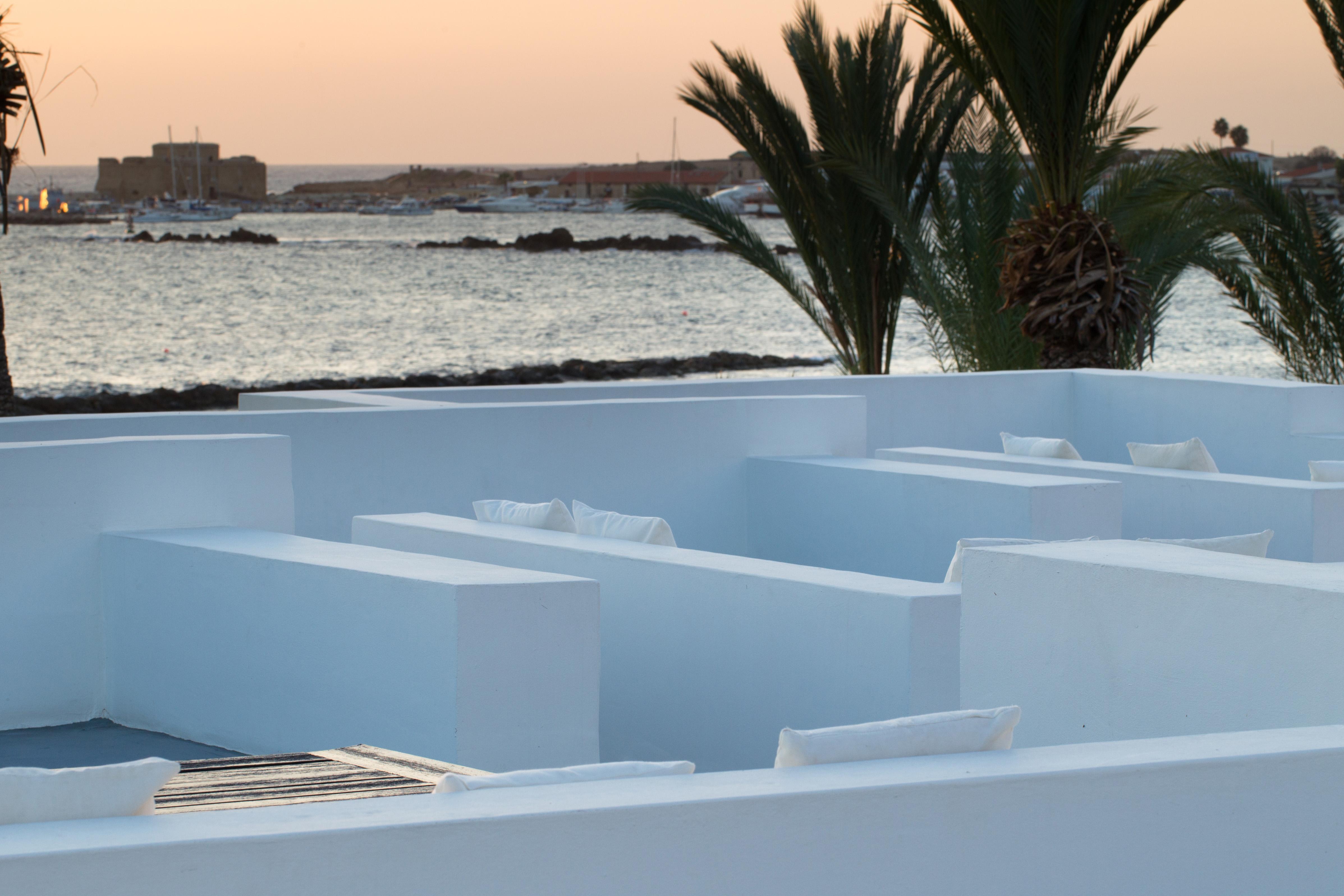 Almyra Hotel Paphos Exterior photo The whitewashed houses of the island