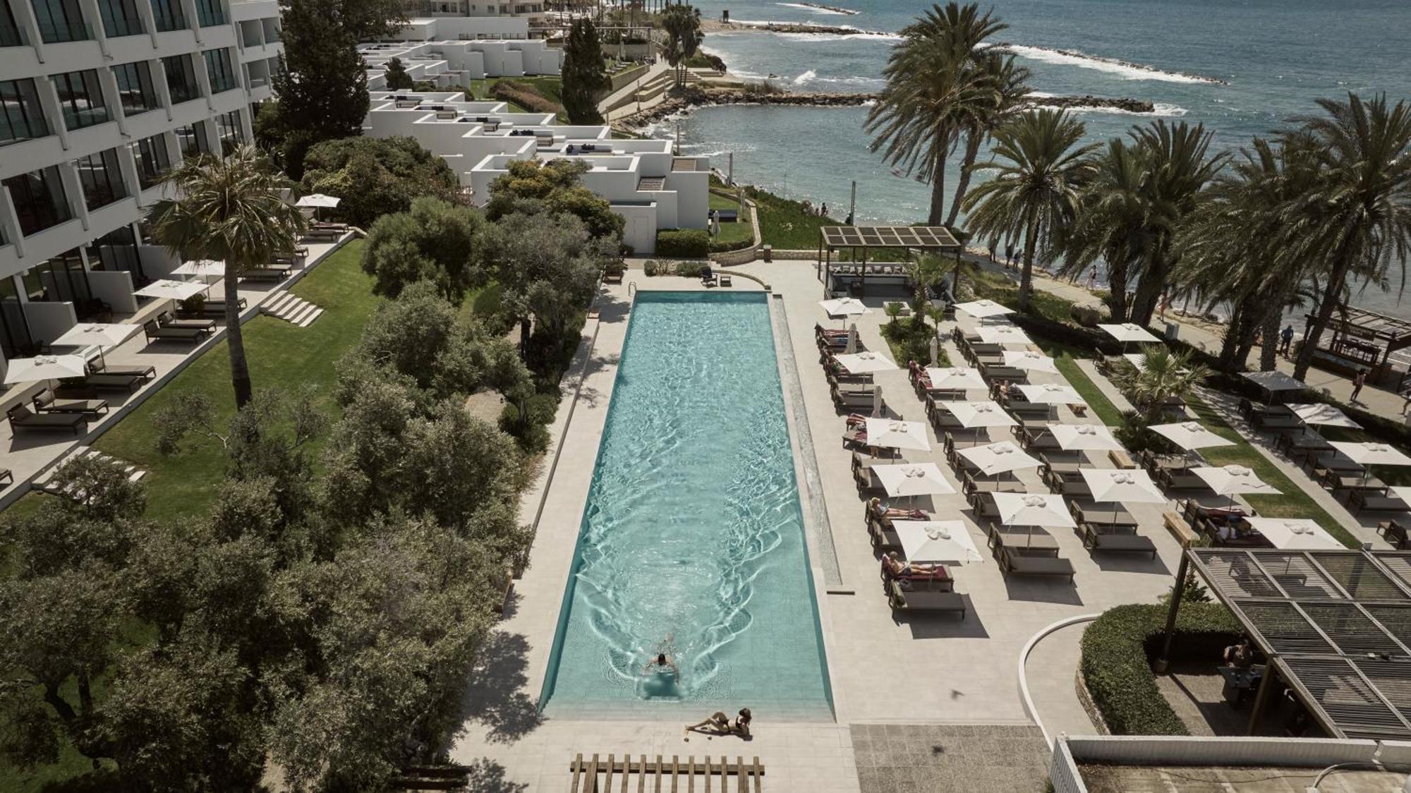 Almyra Hotel Paphos Exterior photo The pool at the Royal