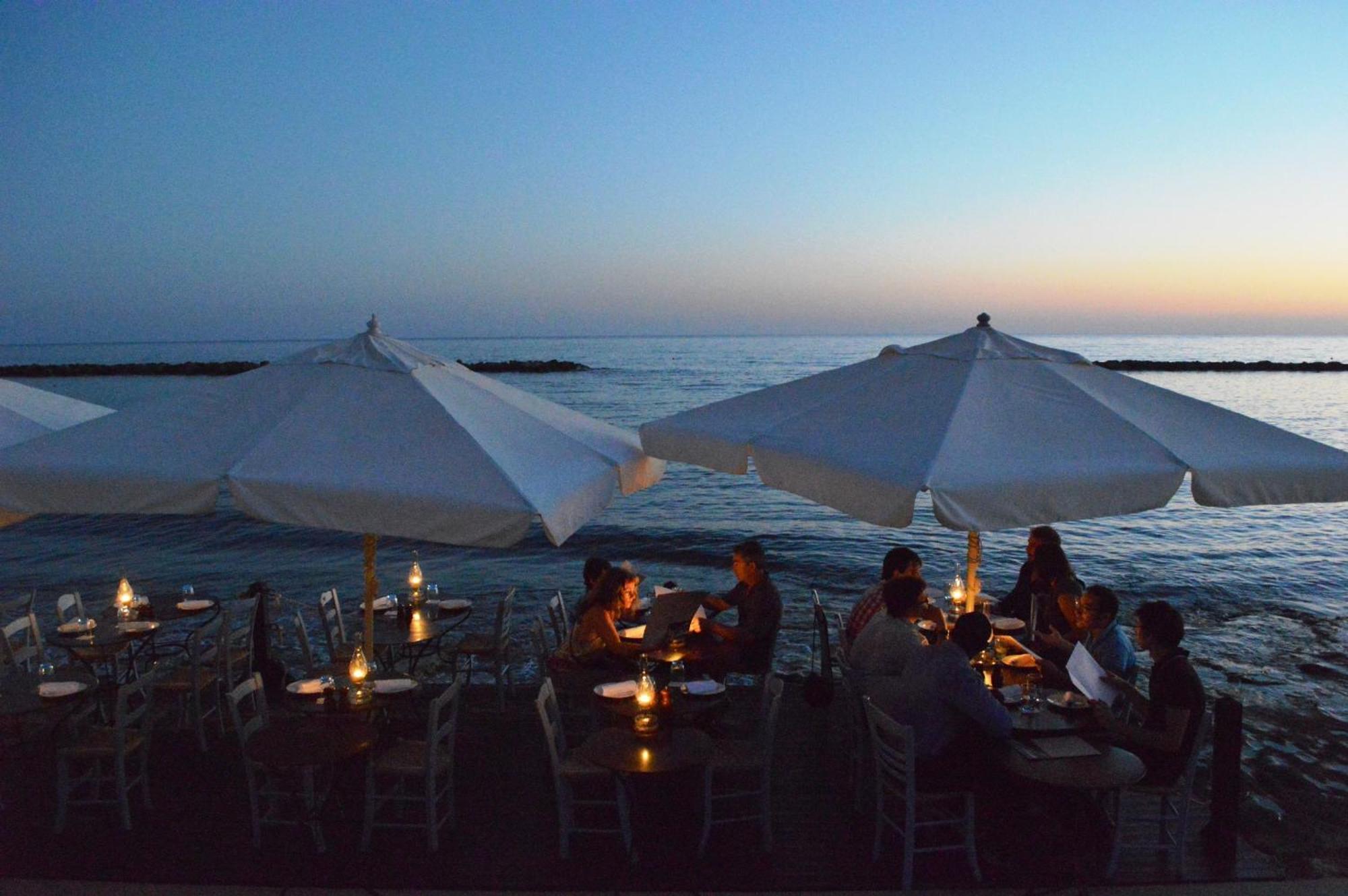Almyra Hotel Paphos Exterior photo Beach restaurant in Italy
