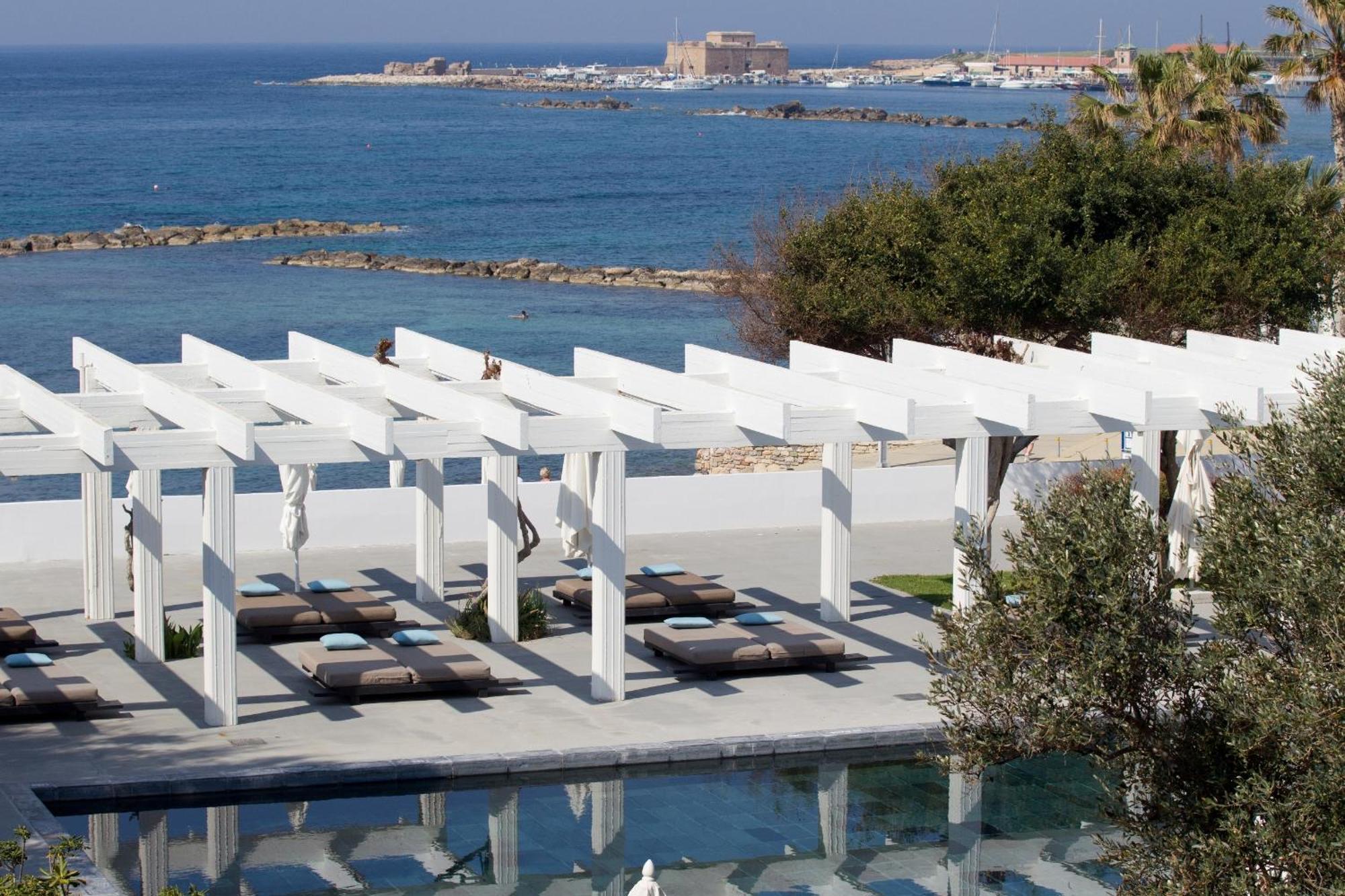 Almyra Hotel Paphos Exterior photo The beach at the hotel